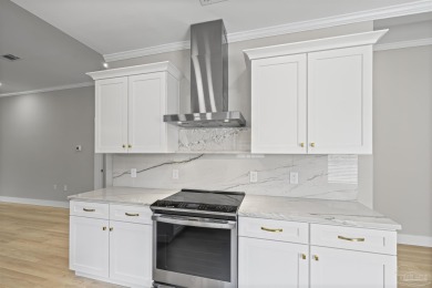 Beautifully updated home on the 13th tee of Tiger Point Golf on Tiger Point Golf and Country Club in Florida - for sale on GolfHomes.com, golf home, golf lot