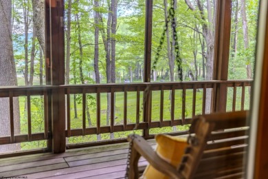 Welcome to 'Putter's Paradise', a delightful cabin nestled in on Alpine Lake Resort in West Virginia - for sale on GolfHomes.com, golf home, golf lot