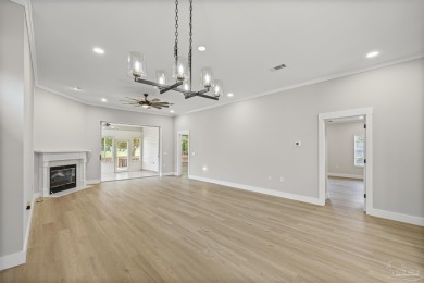 Beautifully updated home on the 13th tee of Tiger Point Golf on Tiger Point Golf and Country Club in Florida - for sale on GolfHomes.com, golf home, golf lot