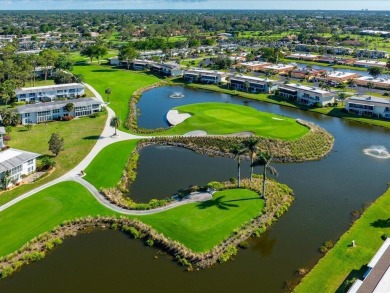 WOW! HERE IS AN AWESOME COZY 2ND FLOOR CONDOMINIUM LOCATED IN on The Glades Golf and Country Club in Florida - for sale on GolfHomes.com, golf home, golf lot