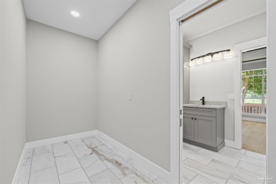 Beautifully updated home on the 13th tee of Tiger Point Golf on Tiger Point Golf and Country Club in Florida - for sale on GolfHomes.com, golf home, golf lot