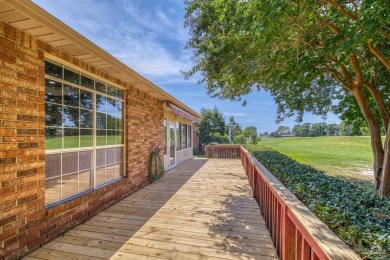 Beautifully updated home on the 13th tee of Tiger Point Golf on Tiger Point Golf and Country Club in Florida - for sale on GolfHomes.com, golf home, golf lot