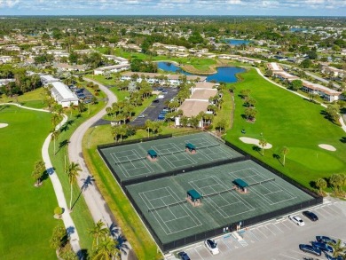 WOW! HERE IS AN AWESOME COZY 2ND FLOOR CONDOMINIUM LOCATED IN on The Glades Golf and Country Club in Florida - for sale on GolfHomes.com, golf home, golf lot