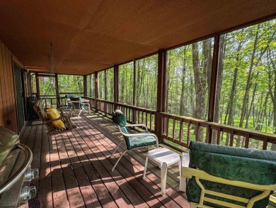 Welcome to 'Putter's Paradise', a delightful cabin nestled in on Alpine Lake Resort in West Virginia - for sale on GolfHomes.com, golf home, golf lot