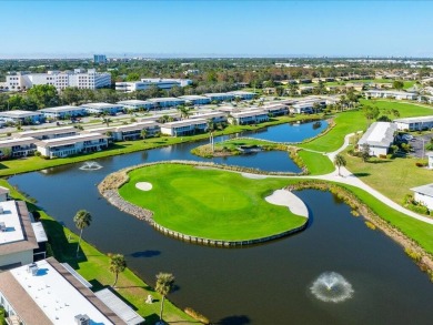 WOW! HERE IS AN AWESOME COZY 2ND FLOOR CONDOMINIUM LOCATED IN on The Glades Golf and Country Club in Florida - for sale on GolfHomes.com, golf home, golf lot