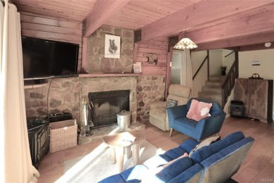 This charming Gambrel-style cabin in the Moonridge section of on Big Bear Mountain Ski and Golf Resort in California - for sale on GolfHomes.com, golf home, golf lot