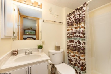 Welcome to 'Putter's Paradise', a delightful cabin nestled in on Alpine Lake Resort in West Virginia - for sale on GolfHomes.com, golf home, golf lot