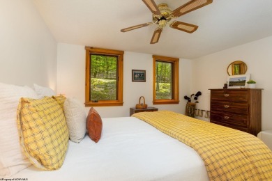 Welcome to 'Putter's Paradise', a delightful cabin nestled in on Alpine Lake Resort in West Virginia - for sale on GolfHomes.com, golf home, golf lot