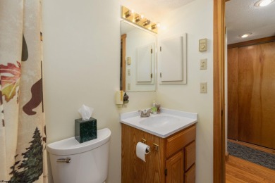 Welcome to 'Putter's Paradise', a delightful cabin nestled in on Alpine Lake Resort in West Virginia - for sale on GolfHomes.com, golf home, golf lot