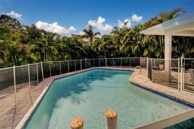 Under contract-accepting backup offers. Discover your dream home on Feather Sound Country Club in Florida - for sale on GolfHomes.com, golf home, golf lot