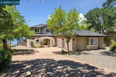 This charming 3-bedroom house on Hidden Valley Lake offers a on Hidden Valley Lake Golf and Country Club in California - for sale on GolfHomes.com, golf home, golf lot