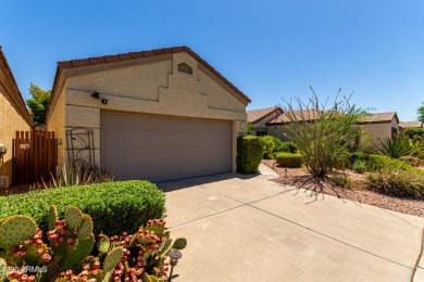 This lovely home is nestled on the 16th fairway of the on Raven Golf Club At South Mountain in Arizona - for sale on GolfHomes.com, golf home, golf lot