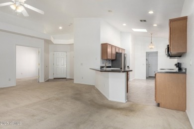 This lovely home is nestled on the 16th fairway of the on Raven Golf Club At South Mountain in Arizona - for sale on GolfHomes.com, golf home, golf lot