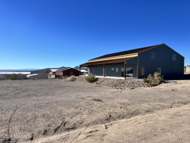 Escape to the tranquil beauty of Elephant Butte with this rare on Sierra Del Rio Golf Club in New Mexico - for sale on GolfHomes.com, golf home, golf lot