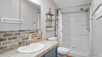 Fully furnished and move-in ready! This beautifully remodeled on Tanglewood Shores Golf Club in Virginia - for sale on GolfHomes.com, golf home, golf lot