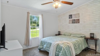 Fully furnished and move-in ready! This beautifully remodeled on Tanglewood Shores Golf Club in Virginia - for sale on GolfHomes.com, golf home, golf lot