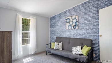 Fully furnished and move-in ready! This beautifully remodeled on Tanglewood Shores Golf Club in Virginia - for sale on GolfHomes.com, golf home, golf lot