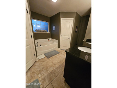 Charming Newer Home in Neosho, MO - Built in 2017. Perfect on Neosho Municipal Golf Course in Missouri - for sale on GolfHomes.com, golf home, golf lot