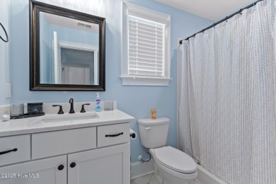 Casual coastal comfort meets a stylishly appointed floor plan on Sea Trail Golf Resort in North Carolina - for sale on GolfHomes.com, golf home, golf lot