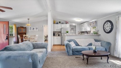 Fully furnished and move-in ready! This beautifully remodeled on Tanglewood Shores Golf Club in Virginia - for sale on GolfHomes.com, golf home, golf lot