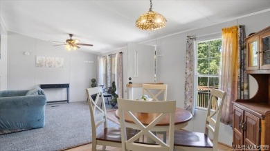 Fully furnished and move-in ready! This beautifully remodeled on Tanglewood Shores Golf Club in Virginia - for sale on GolfHomes.com, golf home, golf lot