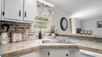Fully furnished and move-in ready! This beautifully remodeled on Tanglewood Shores Golf Club in Virginia - for sale on GolfHomes.com, golf home, golf lot