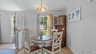 Fully furnished and move-in ready! This beautifully remodeled on Tanglewood Shores Golf Club in Virginia - for sale on GolfHomes.com, golf home, golf lot