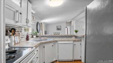 Fully furnished and move-in ready! This beautifully remodeled on Tanglewood Shores Golf Club in Virginia - for sale on GolfHomes.com, golf home, golf lot