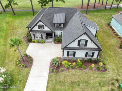 Casual coastal comfort meets a stylishly appointed floor plan on Sea Trail Golf Resort in North Carolina - for sale on GolfHomes.com, golf home, golf lot