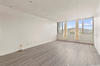 Come home to tranquil golf course views in this 2-bedroom on Honolulu Country Club in Hawaii - for sale on GolfHomes.com, golf home, golf lot