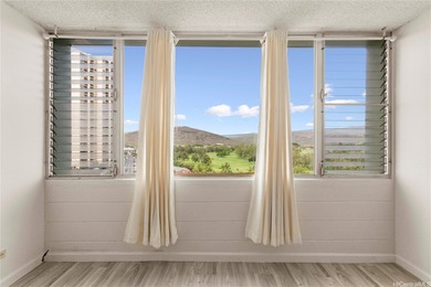 Come home to tranquil golf course views in this 2-bedroom on Honolulu Country Club in Hawaii - for sale on GolfHomes.com, golf home, golf lot