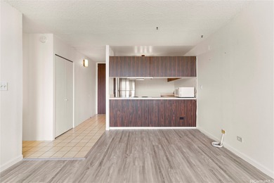 Come home to tranquil golf course views in this 2-bedroom on Honolulu Country Club in Hawaii - for sale on GolfHomes.com, golf home, golf lot