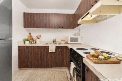 Come home to tranquil golf course views in this 2-bedroom on Honolulu Country Club in Hawaii - for sale on GolfHomes.com, golf home, golf lot