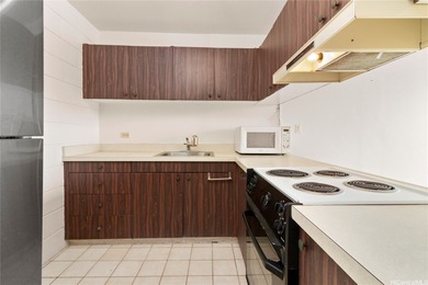 Come home to tranquil golf course views in this 2-bedroom on Honolulu Country Club in Hawaii - for sale on GolfHomes.com, golf home, golf lot