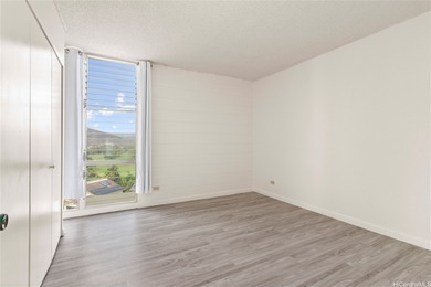 Come home to tranquil golf course views in this 2-bedroom on Honolulu Country Club in Hawaii - for sale on GolfHomes.com, golf home, golf lot