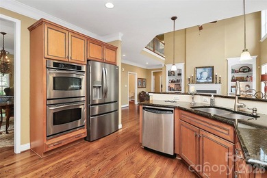 Discover refined living in this elegant full brick home on 3rd on The Palisades Country Club in North Carolina - for sale on GolfHomes.com, golf home, golf lot