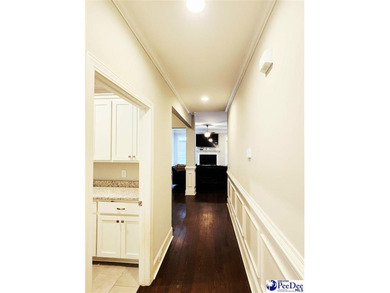 Welcome to 309 Dormie Lane, a luxury residence located behind on The Members Club At Woodcreek in South Carolina - for sale on GolfHomes.com, golf home, golf lot