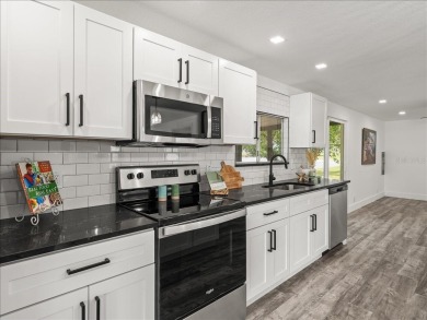 Welcome home to this completely renovated 2 bed, 2-bath home in on Brookridge Country Club in Florida - for sale on GolfHomes.com, golf home, golf lot