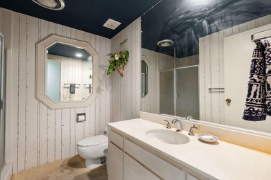 Perched above the shimmering lake and emerald fairways, 899 on Desert Island Golf and Country Club in California - for sale on GolfHomes.com, golf home, golf lot