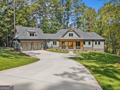Stunning Lakefront Luxury Home in Reynolds Landing with Sunset on Reynolds Lake Oconee - The Landing in Georgia - for sale on GolfHomes.com, golf home, golf lot