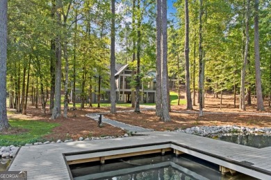 Stunning Lakefront Luxury Home in Reynolds Landing with Sunset on Reynolds Lake Oconee - The Landing in Georgia - for sale on GolfHomes.com, golf home, golf lot