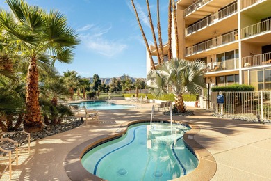 Perched above the shimmering lake and emerald fairways, 899 on Desert Island Golf and Country Club in California - for sale on GolfHomes.com, golf home, golf lot