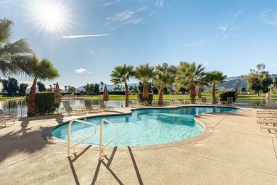 Perched above the shimmering lake and emerald fairways, 899 on Desert Island Golf and Country Club in California - for sale on GolfHomes.com, golf home, golf lot