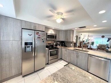 HURRY! Don't miss this amazing price in the desirable Wynmoor on Wynmoor Golf Course in Florida - for sale on GolfHomes.com, golf home, golf lot