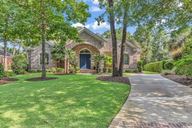 Stunning executive residence, with a pond view, situated all on on The Reserve Golf Club at Pawleys Island in South Carolina - for sale on GolfHomes.com, golf home, golf lot