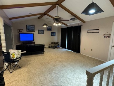Check out this spacious house that sits across the road from on Hilltop Lakes Resort Golf Club in Texas - for sale on GolfHomes.com, golf home, golf lot