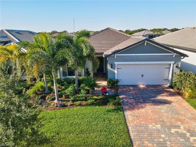 This spacious 2-bedroom/2 bathroom/versatile den Prosperity on Panther Run Golf Club in Florida - for sale on GolfHomes.com, golf home, golf lot