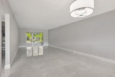 FULLY RENOVATED 2-Bedroom Condo in the Heart of Wynmoor! This on Wynmoor Golf Course in Florida - for sale on GolfHomes.com, golf home, golf lot