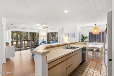 Welcome to your turnkey coastal retreat, fully furnished and on Oyster Bay Golf Links in North Carolina - for sale on GolfHomes.com, golf home, golf lot