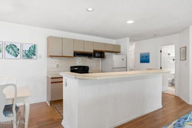 Welcome to your turnkey coastal retreat, fully furnished and on Oyster Bay Golf Links in North Carolina - for sale on GolfHomes.com, golf home, golf lot